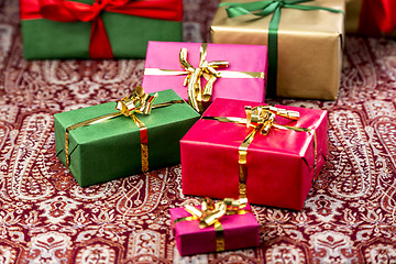 Image showing Gifts in Red, Green and Gold