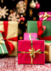 Image showing Christmas Background with Gifts and Glitters