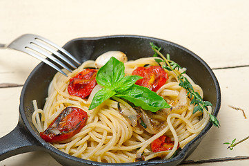 Image showing spaghetti pasta with baked cherry tomatoes and basil 