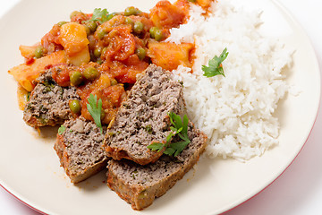 Image showing Meatloaf with tomato sauce and rice