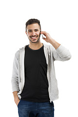 Image showing Young man talking on cell phone