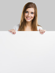 Image showing Woman with a big blank board