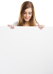 Image showing Woman with a big blank board