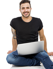 Image showing Man working with a laptop