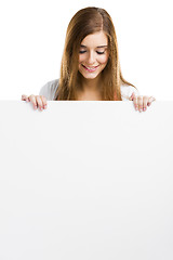 Image showing Woman with a big blank board