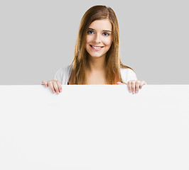 Image showing Woman with a big blank board