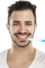 Image showing Man brushing the teeth