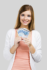 Image showing Beautiful woman holding money