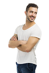 Image showing Smiling guy looking over shoulder