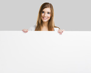 Image showing Woman with a big blank board