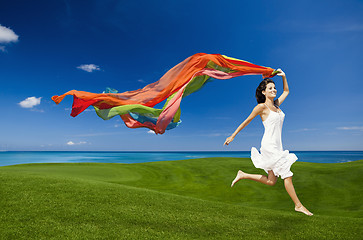 Image showing jumping with colored tissues