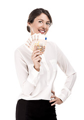 Image showing Woman holding euro currency notes