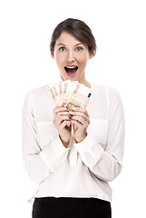 Image showing Woman holding euro currency notes