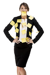 Image showing Business woman with yellow paper notes
