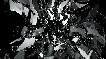 Image showing glass breaking with motion blur on black