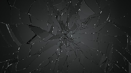 Image showing Shattered and destructed glass on black