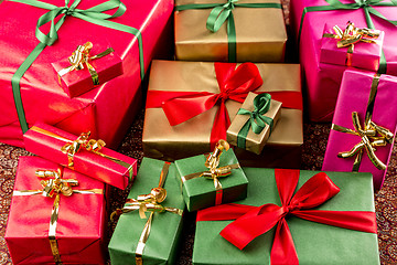 Image showing Wrapped Gifts Assorted by Color
