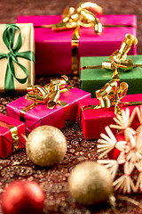 Image showing Little Christmas Gifts in Festive Setting