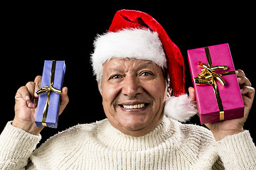 Image showing Euphoric Old Man With Two Presents And Santa Hat