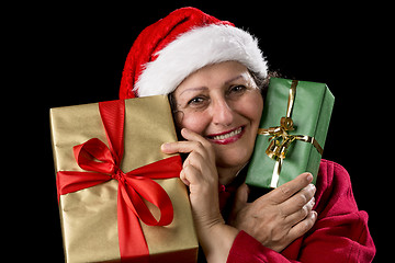 Image showing Old Woman in Red with Two Wrapped Christmas Gifts
