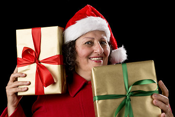 Image showing Cheerful Old Lady with Two Wrapped Golden Gifts 
