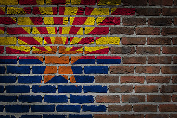 Image showing Brick wall texture with flag