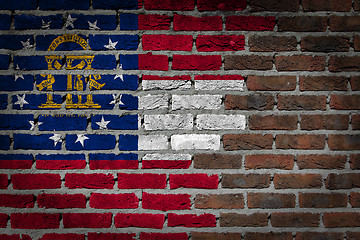 Image showing Brick wall texture with flag