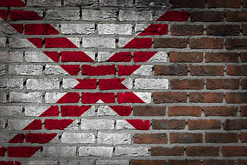 Image showing Brick wall texture with flag