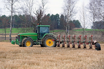 Image showing John Deere 8100 Agricultural Tractor and Kverneland PB100 Plough