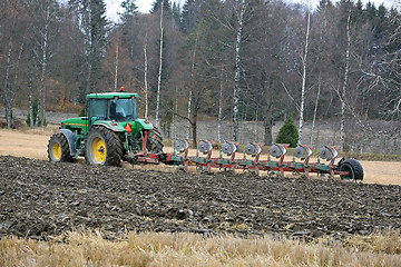 Image showing John Deere 8100 Agricultural Tractor and Kverneland PB100 Plough