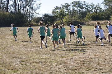 Image showing Cross Country Runners Leave the Starting Line