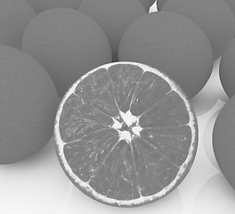 Image showing half oranges and oranges