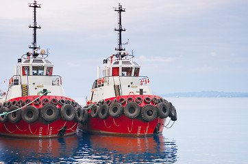 Image showing red tugboats