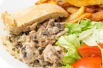 Image showing Chicken and mushroom pudding closeup