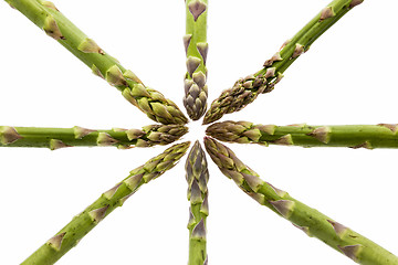 Image showing Eight Asparagus Spears Define the Center