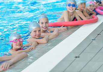 Image showing children group  at swimming pool