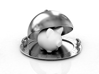 Image showing Glossy golden salver dish with piggy bank under a golden cover 
