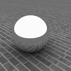 Image showing Chrome ball on the brick floor 