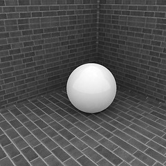 Image showing The white plastic ball in the corner of a brick 