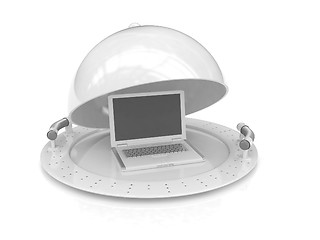 Image showing Restaurant cloche and laptop with open lid 