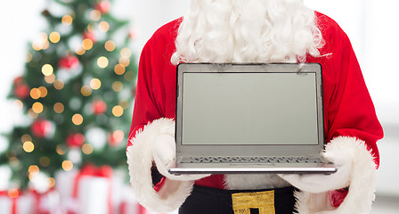 Image showing close up of santa claus with laptop