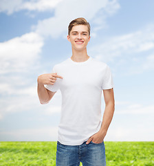 Image showing smiling young man in blank white t-shirt