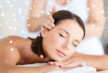 Image showing beautiful woman getting face or head massage