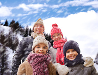 Image showing happy family in winter clothes outdoors