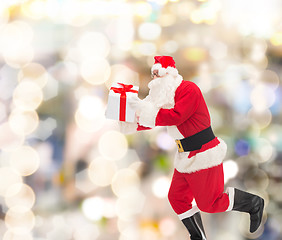 Image showing man in costume of santa claus with gift box