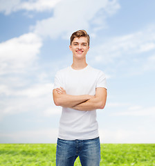 Image showing smiling young man in blank white t-shirt