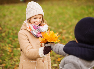 Image showing smiling children in autumn park