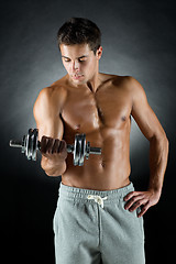 Image showing young man with dumbbell