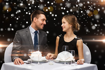 Image showing smiling couple at restaurant