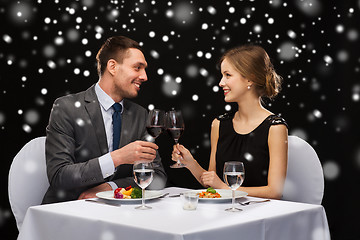 Image showing smiling couple at restaurant